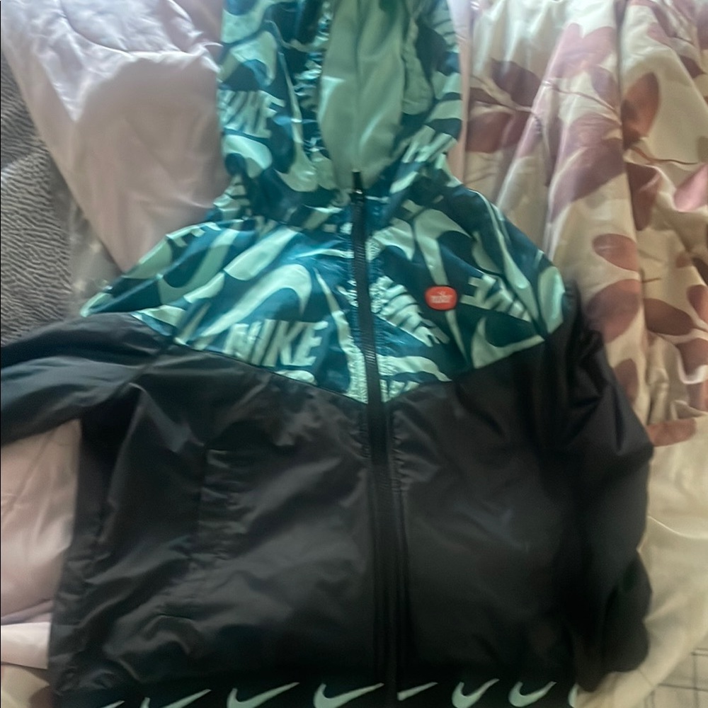 Nike Blue and Black Raincoat Weather-Resistant Design